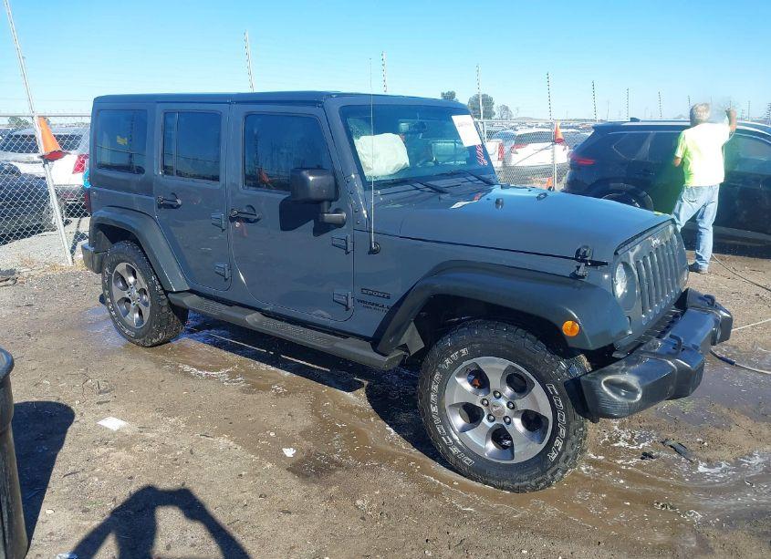2016 Jeep Wrangler UNLIMITED SPORT (VIN 1C4HJWDGXGL311552) main photo