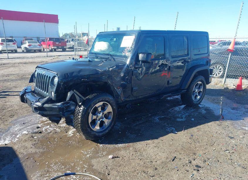 Photo 2 of 2016 Jeep Wrangler UNLIMITED SPORT (VIN 1C4HJWDGXGL311552)