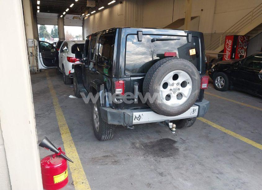 Photo 3 of 2013 Jeep Wrangler UNLIMITED SAHARA (VIN 1C4HJWEG4DL705235)