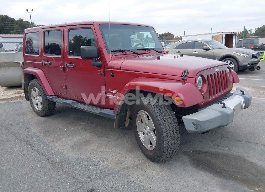 2012 Jeep Wrangler UNLIMITED SAHARA (VIN 1C4HJWEG9CL106877) main photo