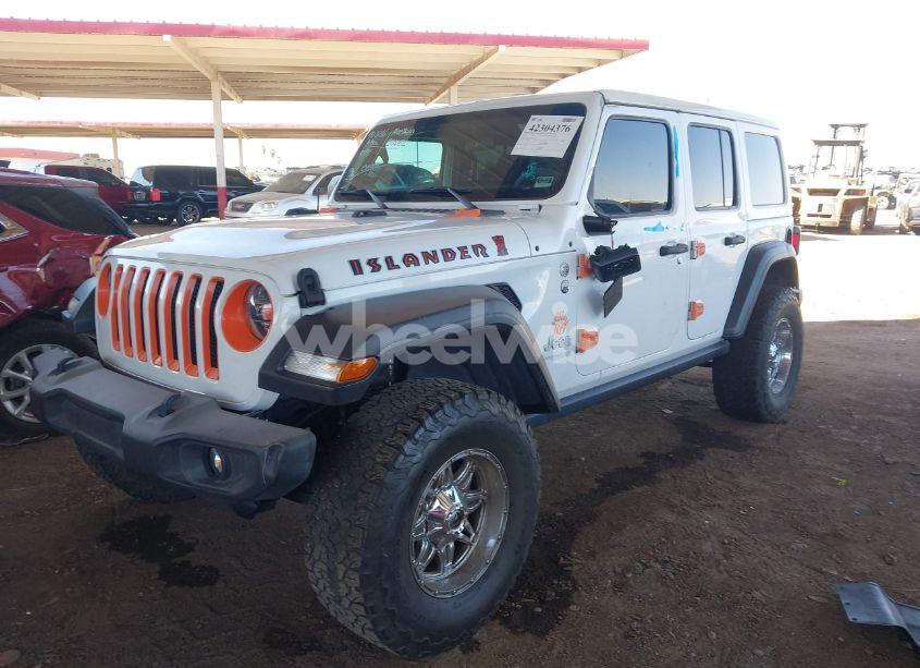Photo 2 of 2021 Jeep Wrangler UNLIMITED ISLANDER 4X4 (VIN 1C4HJXDG2MW575235)