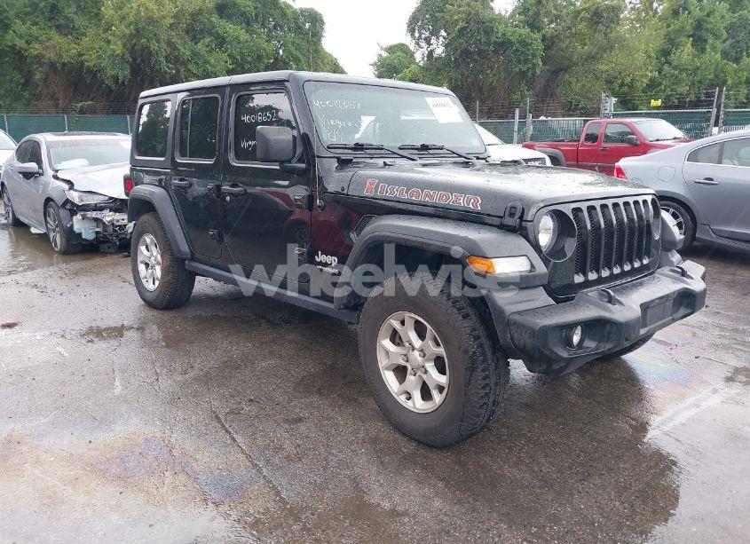 2021 Jeep Wrangler UNLIMITED ISLANDER 4X4 (VIN 1C4HJXDMXMW589213) main photo