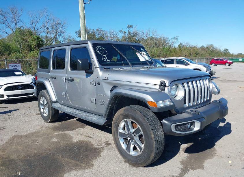 2019 Jeep Wrangler UNLIMITED SAHARA 4X4 (VIN 1C4HJXEG3KW528064) main photo