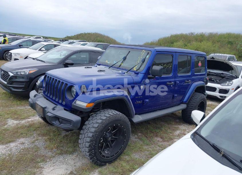 Photo 2 of 2019 Jeep Wrangler UNLIMITED SAHARA 4X4 (VIN 1C4HJXEG7KW633349)