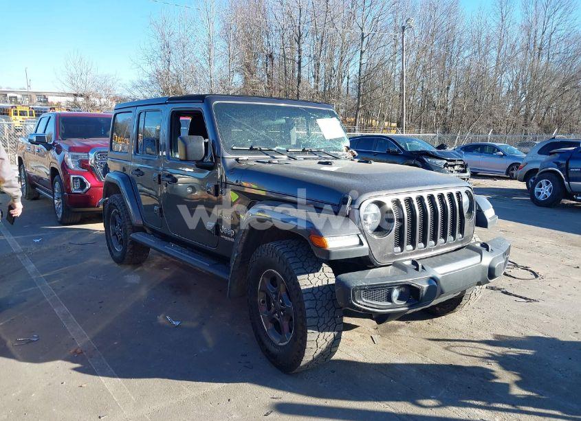 2019 Jeep Wrangler UNLIMITED SAHARA 4X4 (VIN 1C4HJXEG8KW621176) main photo