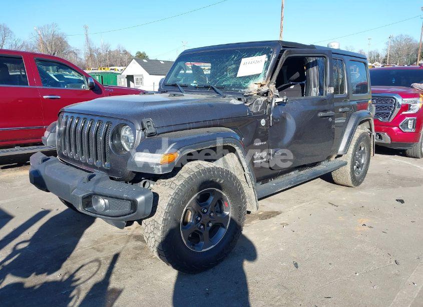 Photo 2 of 2019 Jeep Wrangler UNLIMITED SAHARA 4X4 (VIN 1C4HJXEG8KW621176)