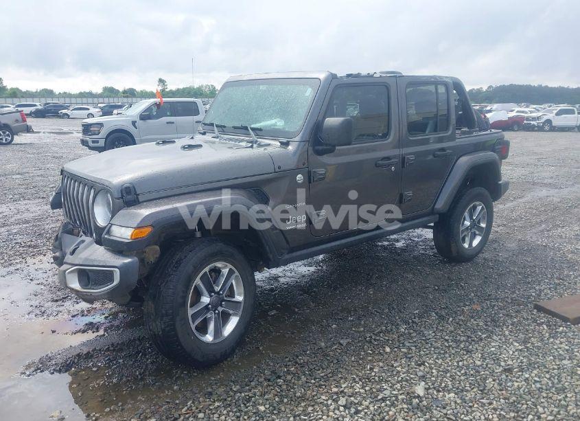 Photo 2 of 2019 Jeep Wrangler UNLIMITED SAHARA 4X4 (VIN 1C4HJXEG8KW627530)