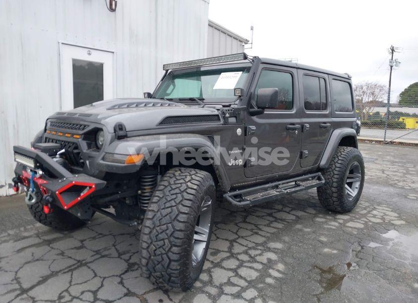 Photo 2 of 2023 Jeep Wrangler 4-DOOR SAHARA 4X4 (VIN 1C4HJXEGXPW501726)