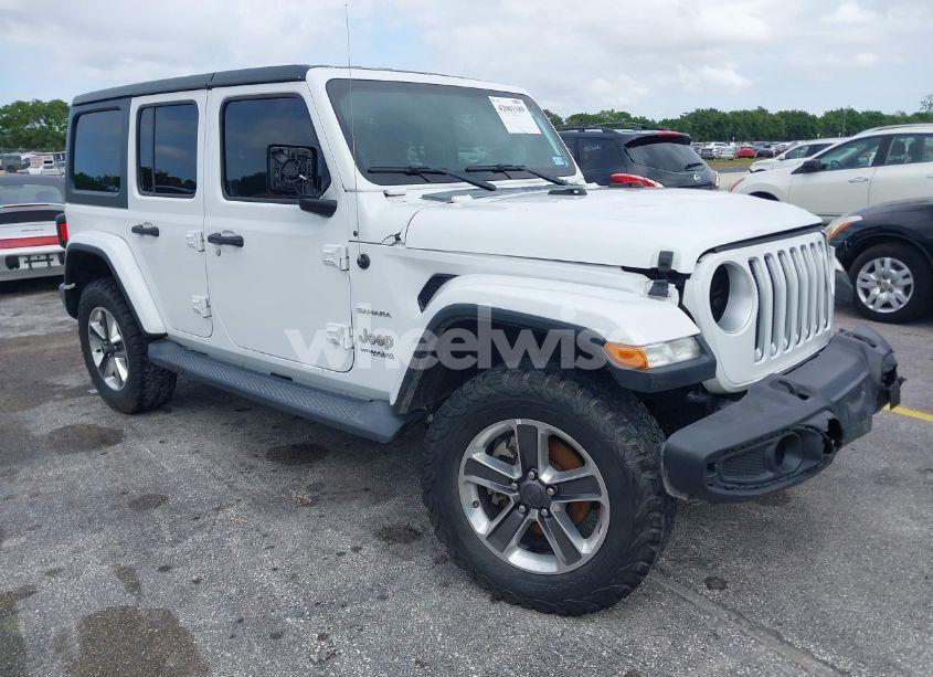 2019 Jeep Wrangler UNLIMITED SAHARA 4X4 (VIN 1C4HJXEN0KW623325) main photo