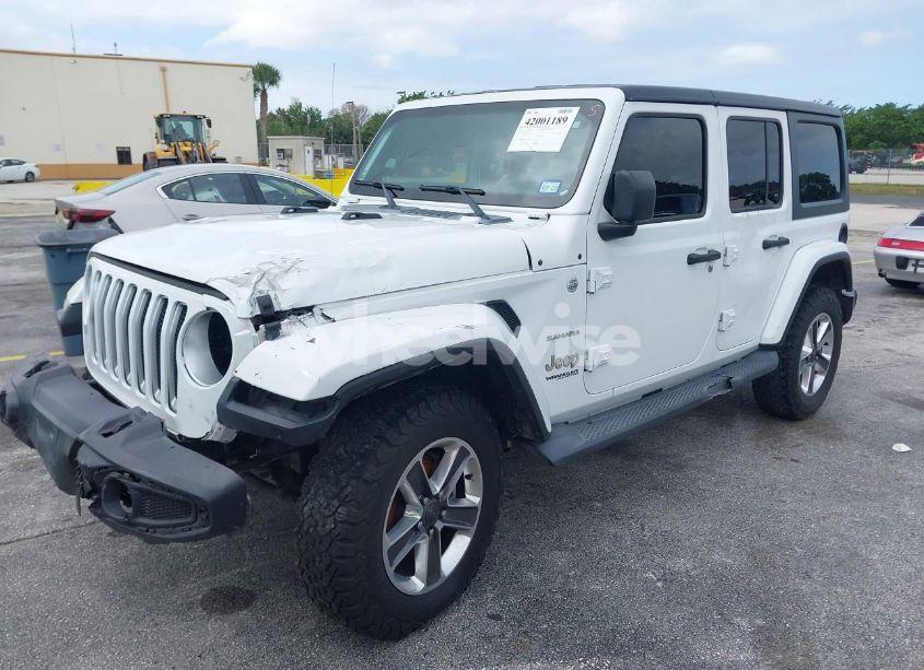 Photo 2 of 2019 Jeep Wrangler UNLIMITED SAHARA 4X4 (VIN 1C4HJXEN0KW623325)