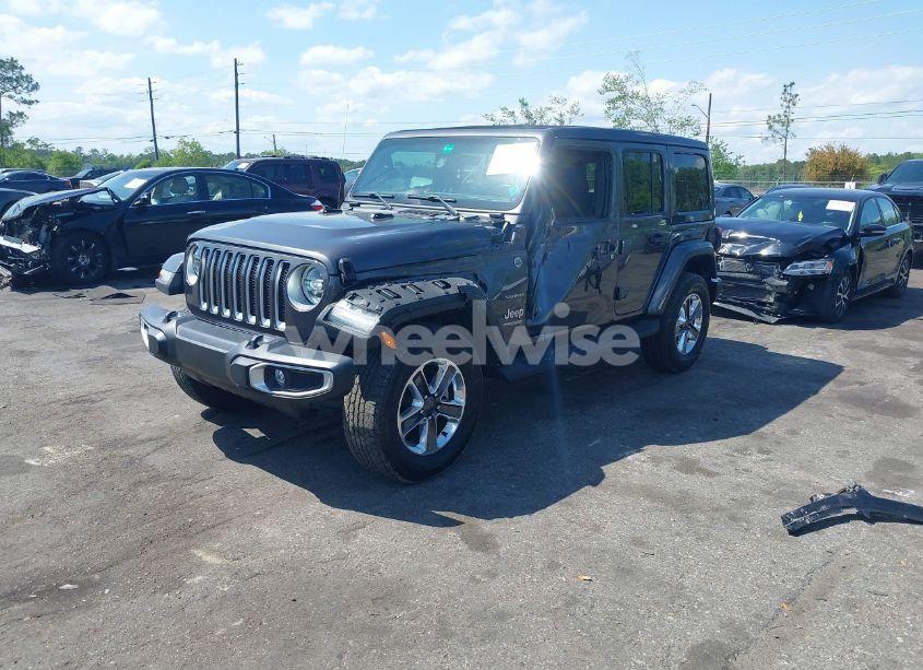 Photo 2 of 2022 Jeep Wrangler UNLIMITED SAHARA 4X4 (VIN 1C4HJXEN2NW194502)