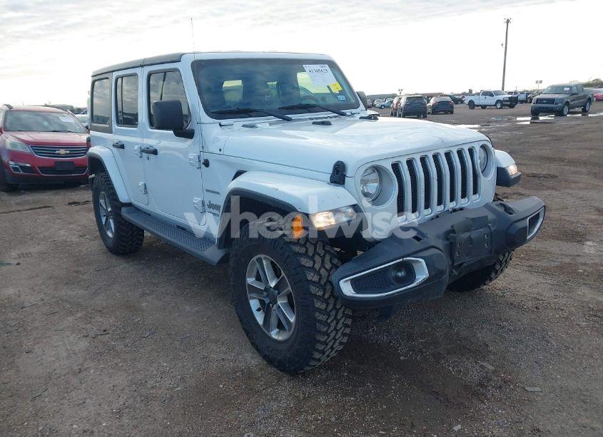 2019 Jeep Wrangler UNLIMITED SAHARA 4X4 (VIN 1C4HJXEN4KW592063) main photo