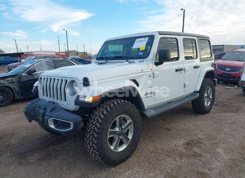 Photo 2 of 2019 Jeep Wrangler UNLIMITED SAHARA 4X4 (VIN 1C4HJXEN4KW592063)