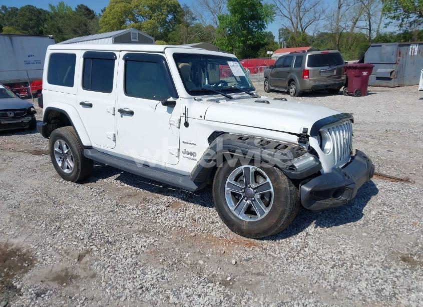 2019 Jeep Wrangler UNLIMITED SAHARA 4X4 (VIN 1C4HJXEN5KW509806) main photo