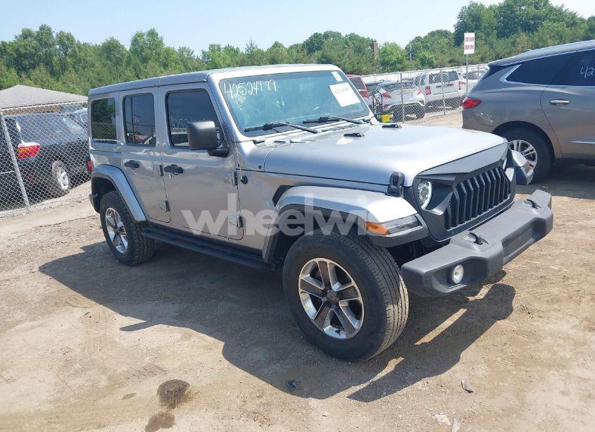 2019 Jeep Wrangler UNLIMITED SAHARA 4X4 (VIN 1C4HJXEN5KW542403) main photo