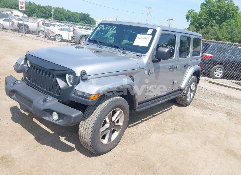 Photo 2 of 2019 Jeep Wrangler UNLIMITED SAHARA 4X4 (VIN 1C4HJXEN5KW542403)