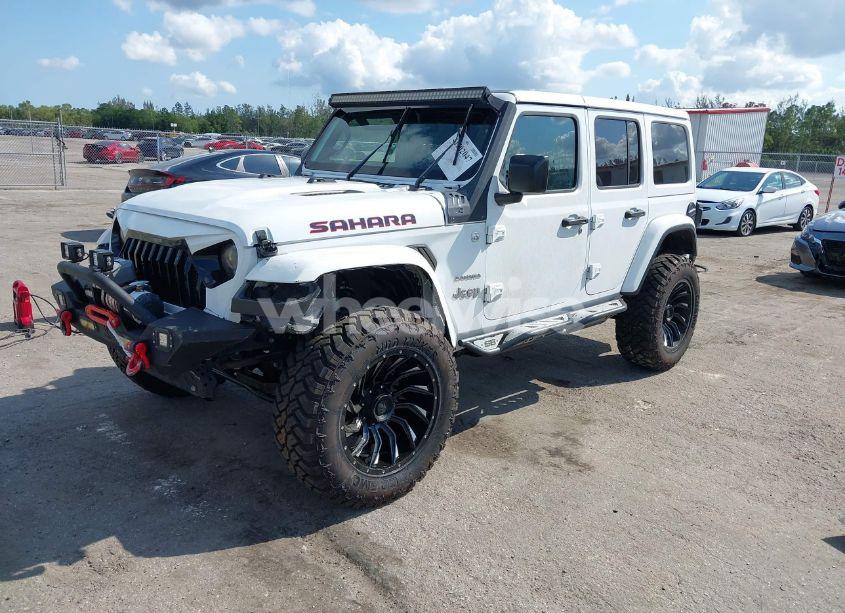 Photo 2 of 2020 Jeep Wrangler UNLIMITED SAHARA 4X4 (VIN 1C4HJXEN7LW213459)