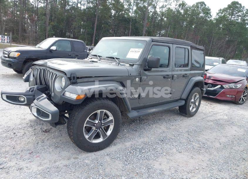 Photo 2 of 2019 Jeep Wrangler UNLIMITED SAHARA 4X4 (VIN 1C4HJXEN8KW624805)