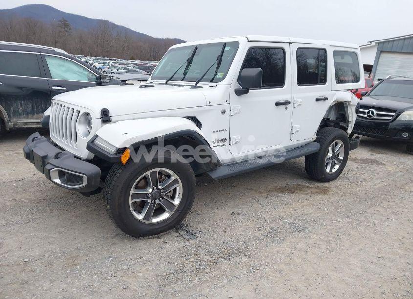 Photo 2 of 2019 Jeep Wrangler UNLIMITED SAHARA 4X4 (VIN 1C4HJXENXKW519425)