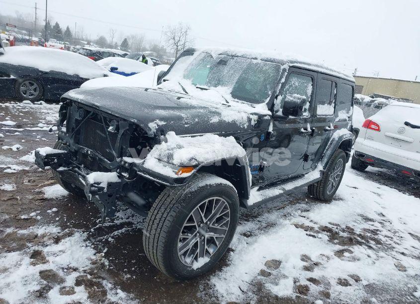 Photo 2 of 2022 Jeep Wrangler 4XE UNLIMITED HIGH ALTITUDE 4X4 (VIN 1C4JJXP61NW239596)