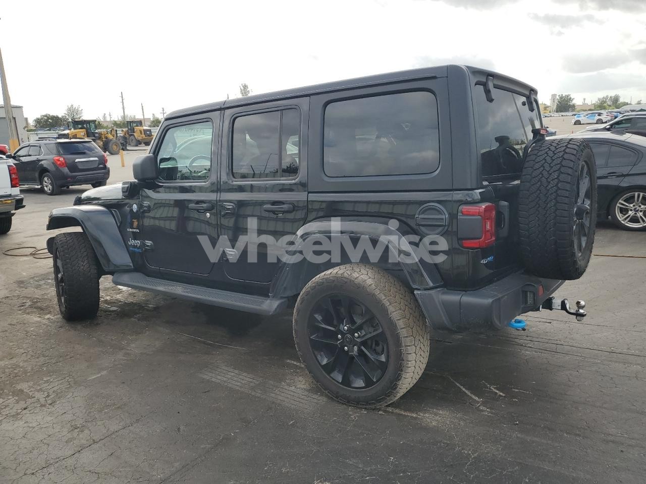 Photo 2 of 2022 JEEP WRANGLER UNLIMITED SAHARA 4XE (VIN 1C4JJXP66NW114318)