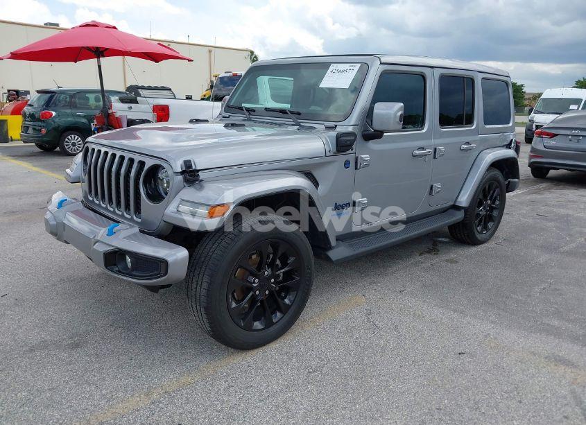 Photo 2 of 2021 Jeep Wrangler 4XE UNLIMITED HIGH ALTITUDE 4X4 (VIN 1C4JJXP67MW686559)
