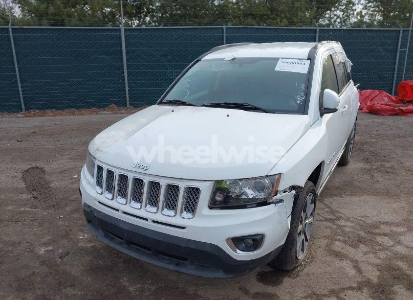 Photo 2 of 2014 Jeep Compass LIMITED (VIN 1C4NJCCB6ED672694)