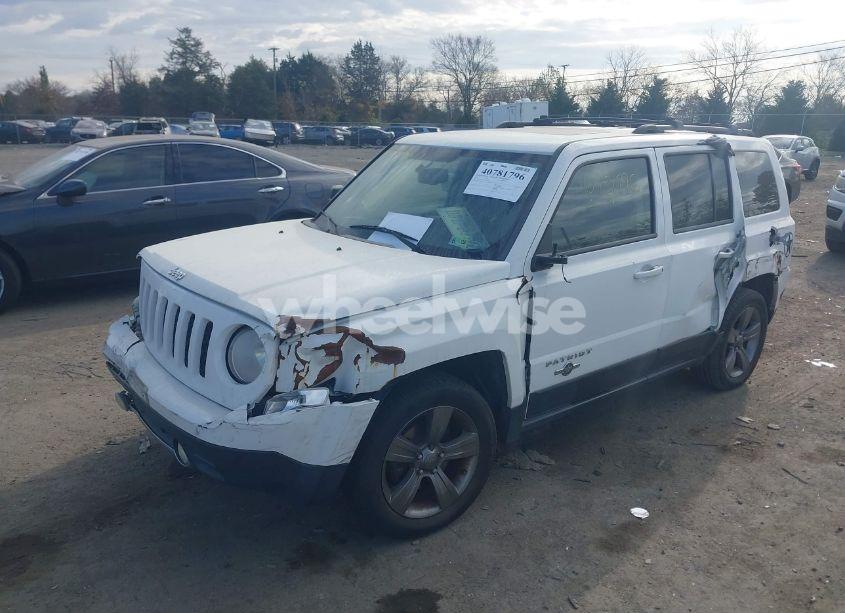 Photo 2 of 2014 Jeep Patriot LATITUDE (VIN 1C4NJPFAXED659828)