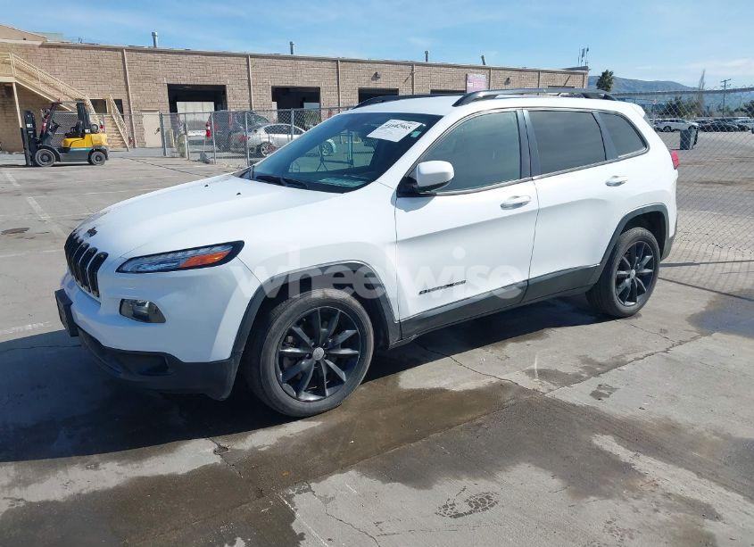 Photo 2 of 2014 Jeep Cherokee ALTITUDE (VIN 1C4PJLCB3EW302204)