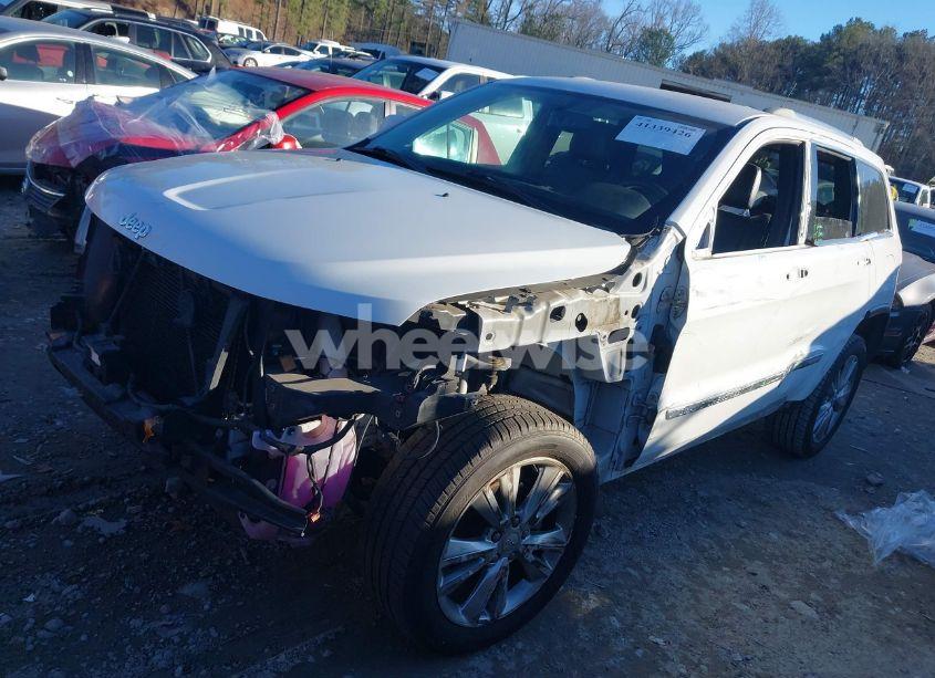 Photo 2 of 2013 Jeep Grand CHEROKEE LAREDO (VIN 1C4RJEAT7DC564338)
