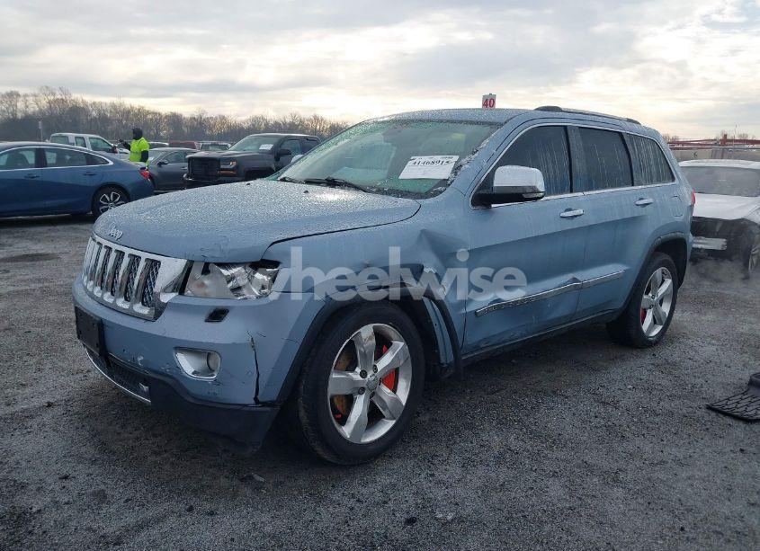Photo 2 of 2013 Jeep Grand CHEROKEE OVERLAND SUMMIT (VIN 1C4RJFCT2DC572978)