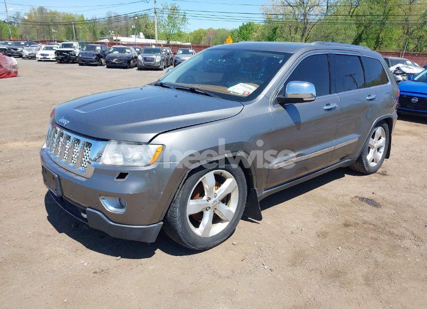 Photo 2 of 2013 Jeep Grand CHEROKEE OVERLAND SUMMIT (VIN 1C4RJFCTXDC555233)