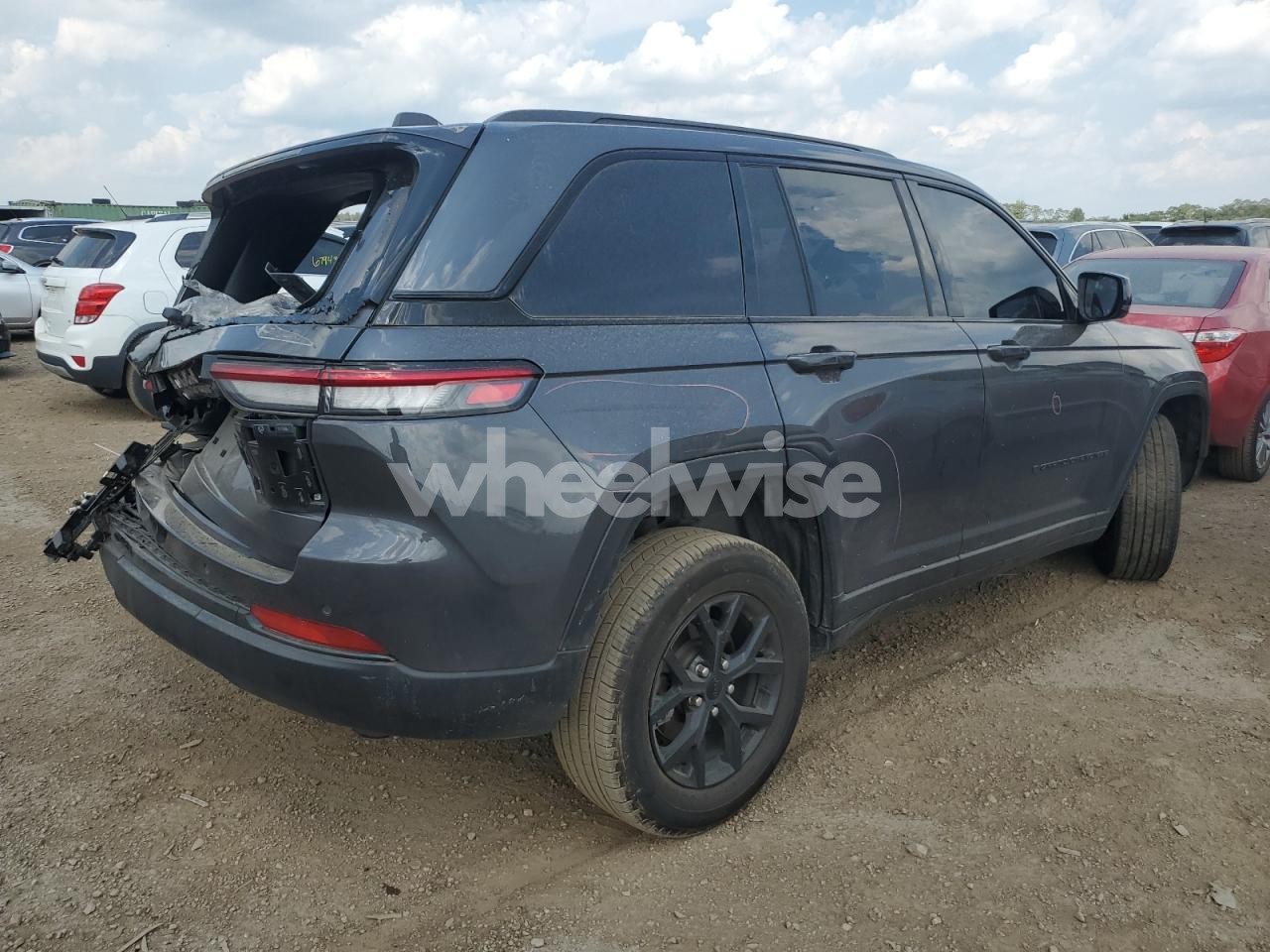 Photo 3 of 2024 JEEP GRAND CHEROKEE LAREDO (VIN 1C4RJHAGXR8591693)