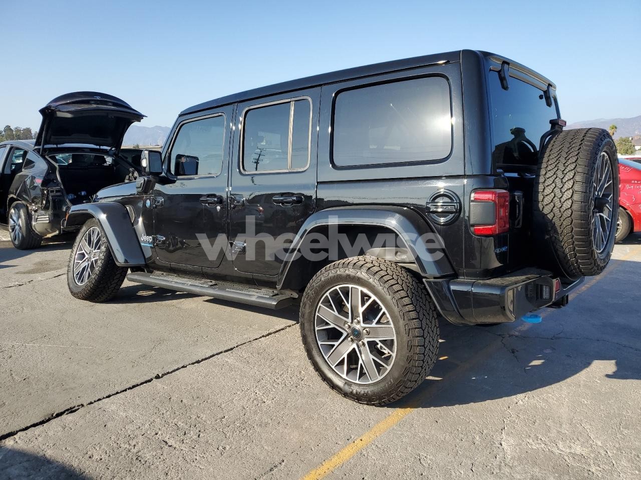 Photo 2 of 2024 JEEP WRANGLER HIGH ALTITUDE 4XE (VIN 1C4RJXU69RW141896)