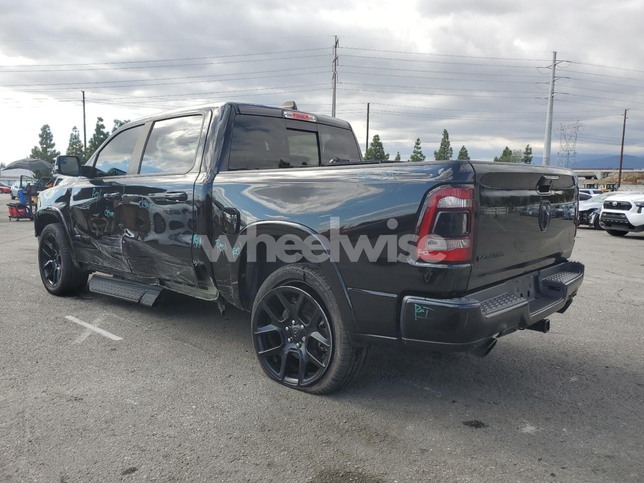 Photo 2 of 2021 RAM 1500 LARAMIE (VIN 1C6RREJT2MN820857)