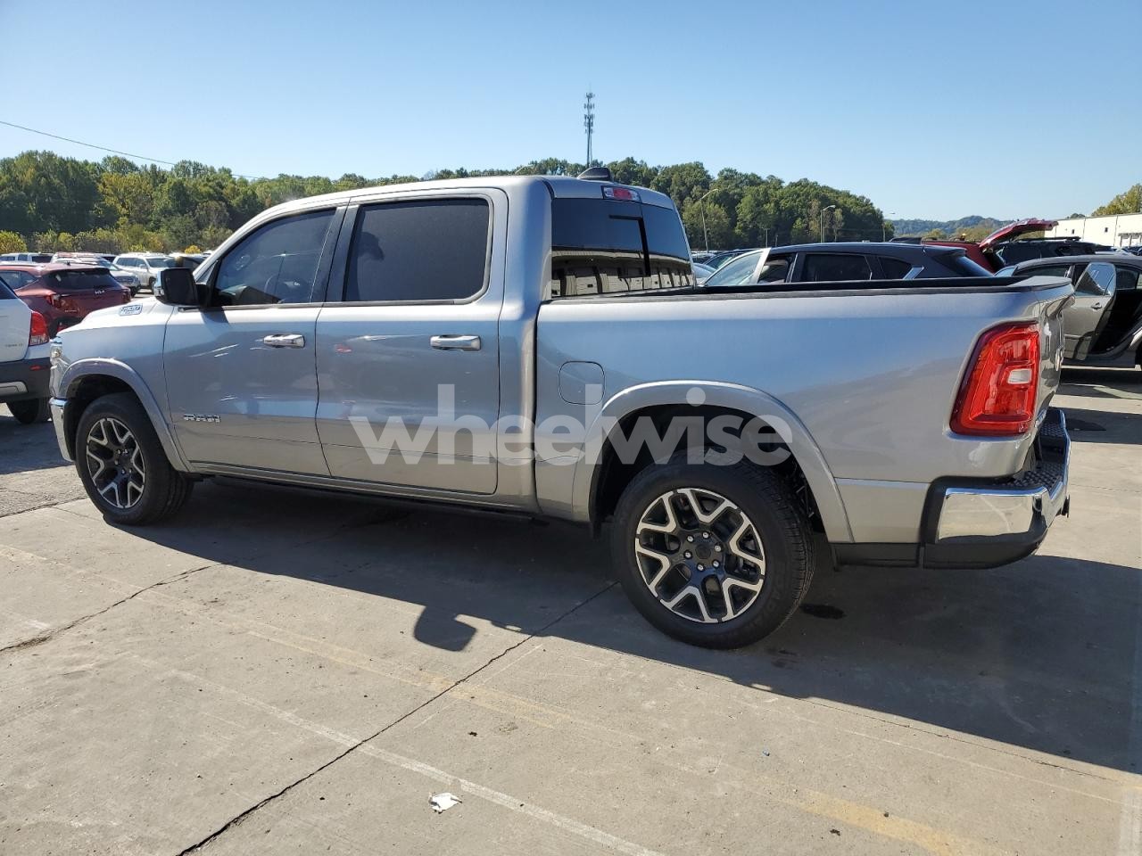 Photo 2 of 2025 RAM 1500 LARAMIE (VIN 1C6SRFJP1SN553296)