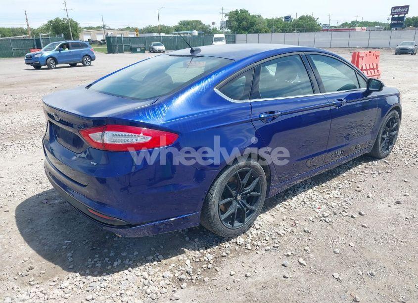 Photo 4 of 2015 Ford Fusion SE (VIN 1FA6P0H70F5115772)