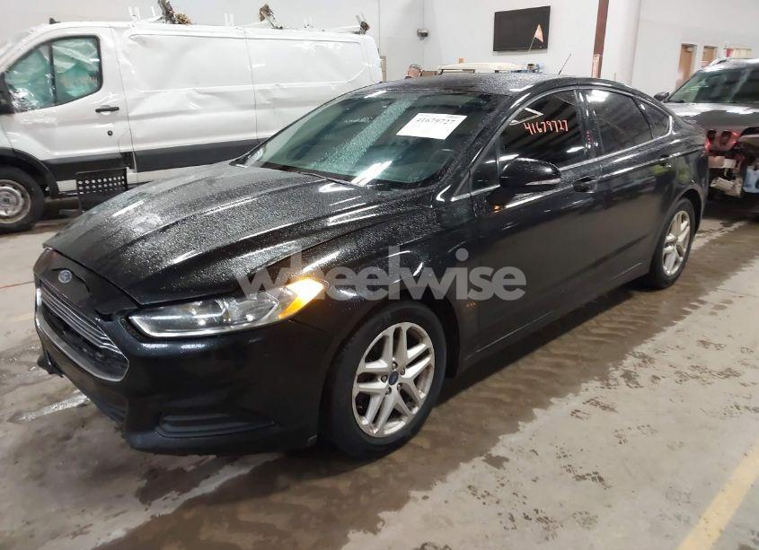 Photo 2 of 2016 Ford Fusion SE (VIN 1FA6P0H7XG5102996)
