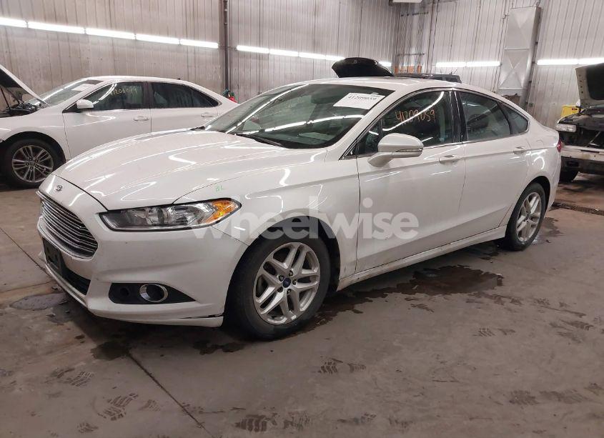 Photo 2 of 2014 Ford Fusion SE (VIN 1FA6P0HD2E5356740)