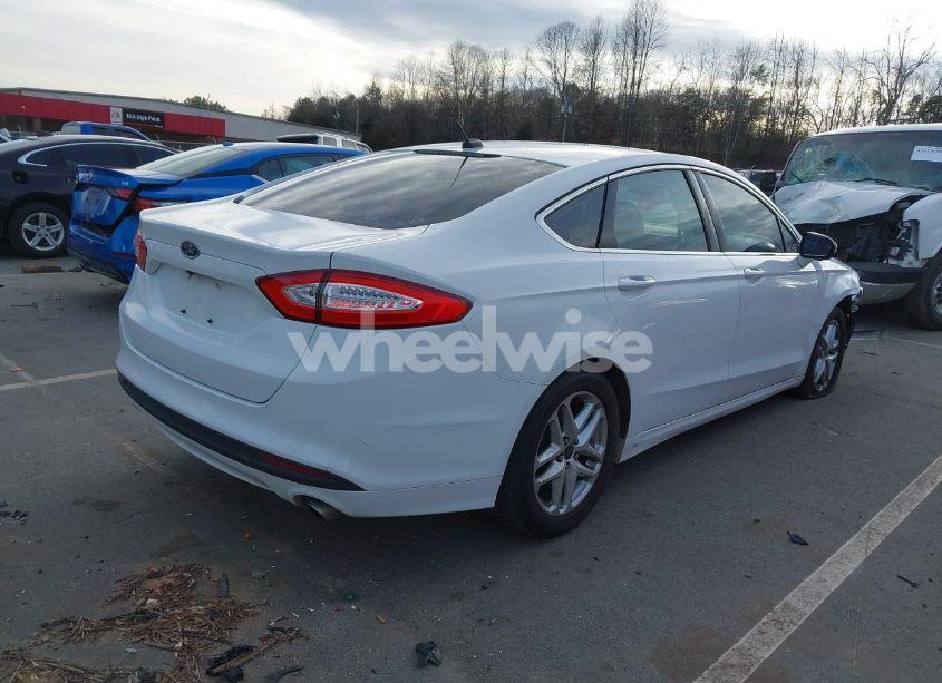 Photo 4 of 2016 Ford Fusion SE (VIN 1FA6P0HDXG5115804)