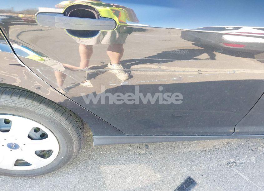 Photo 12 of 2013 Ford Focus S (VIN 1FADP3E21DL274763)