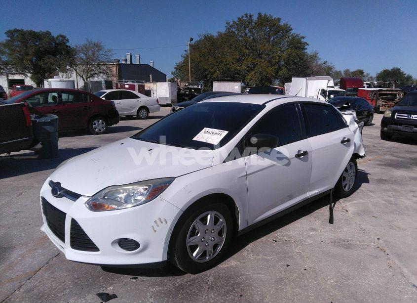 Photo 2 of 2014 Ford Focus S (VIN 1FADP3E21EL306550)