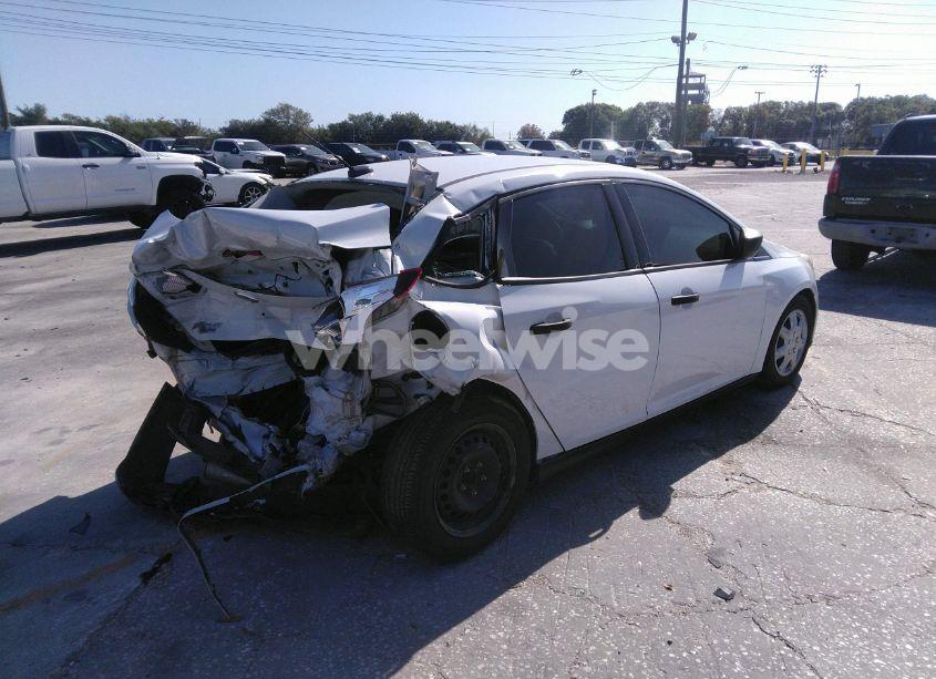 Photo 4 of 2014 Ford Focus S (VIN 1FADP3E21EL306550)