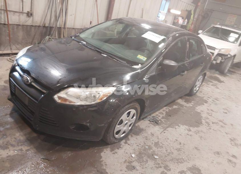 Photo 2 of 2014 Ford Focus S (VIN 1FADP3E22EL344210)