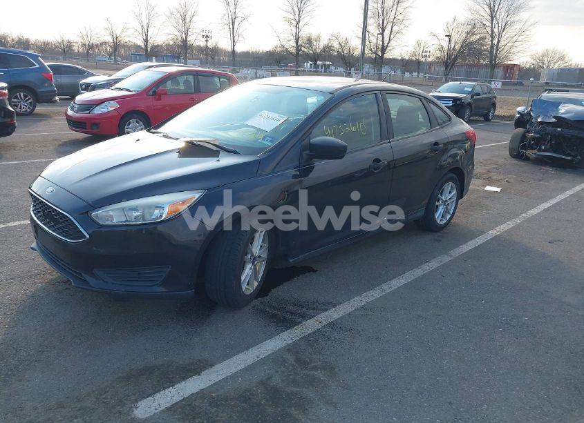 Photo 2 of 2015 Ford Focus S (VIN 1FADP3E22FL215921)