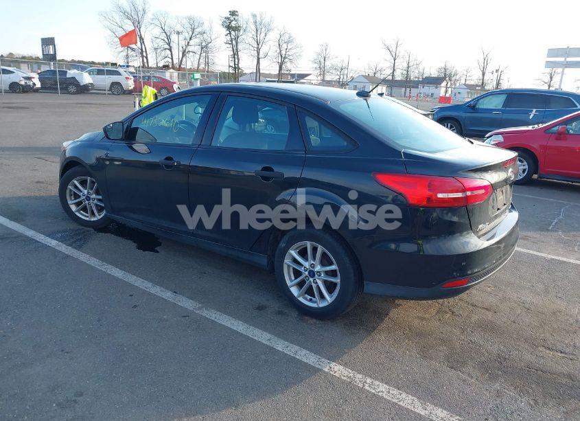 Photo 3 of 2015 Ford Focus S (VIN 1FADP3E22FL215921)