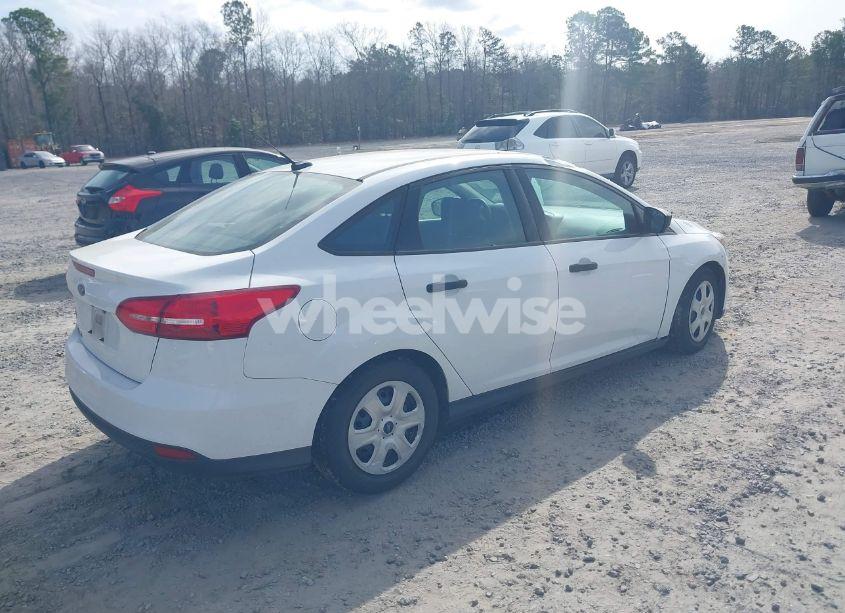 Photo 4 of 2015 Ford Focus S (VIN 1FADP3E22FL295981)