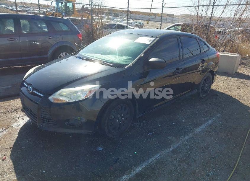 Photo 2 of 2014 Ford Focus S (VIN 1FADP3E23EL390922)