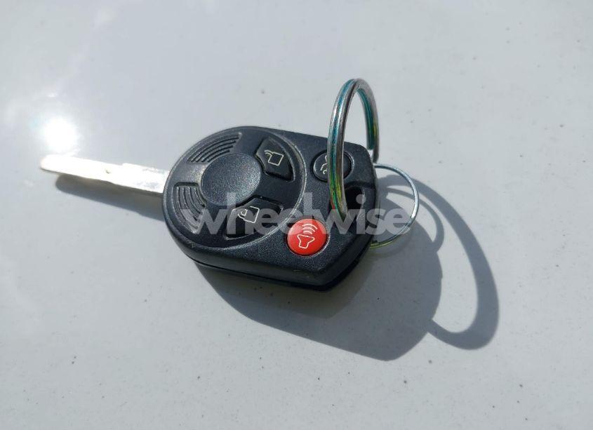 Photo 11 of 2014 Ford Focus S (VIN 1FADP3E23EL417827)