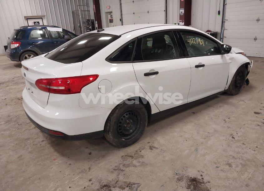 Photo 4 of 2017 Ford Focus S (VIN 1FADP3E23HL340106)